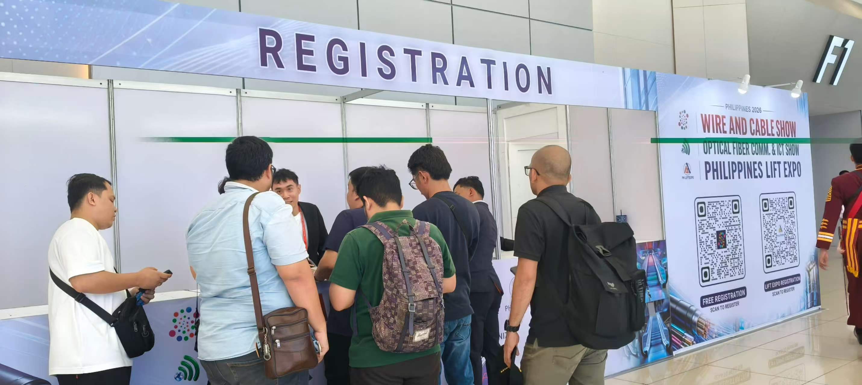 Professional visitors at the Philippines show registration desk